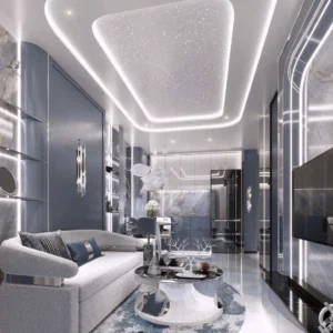 Modern open-plan living room and kitchen interior at Embassy World Jomtien featuring a signature illuminated starry ceiling panel, luxury sofa, and integrated LED architectural lighting.